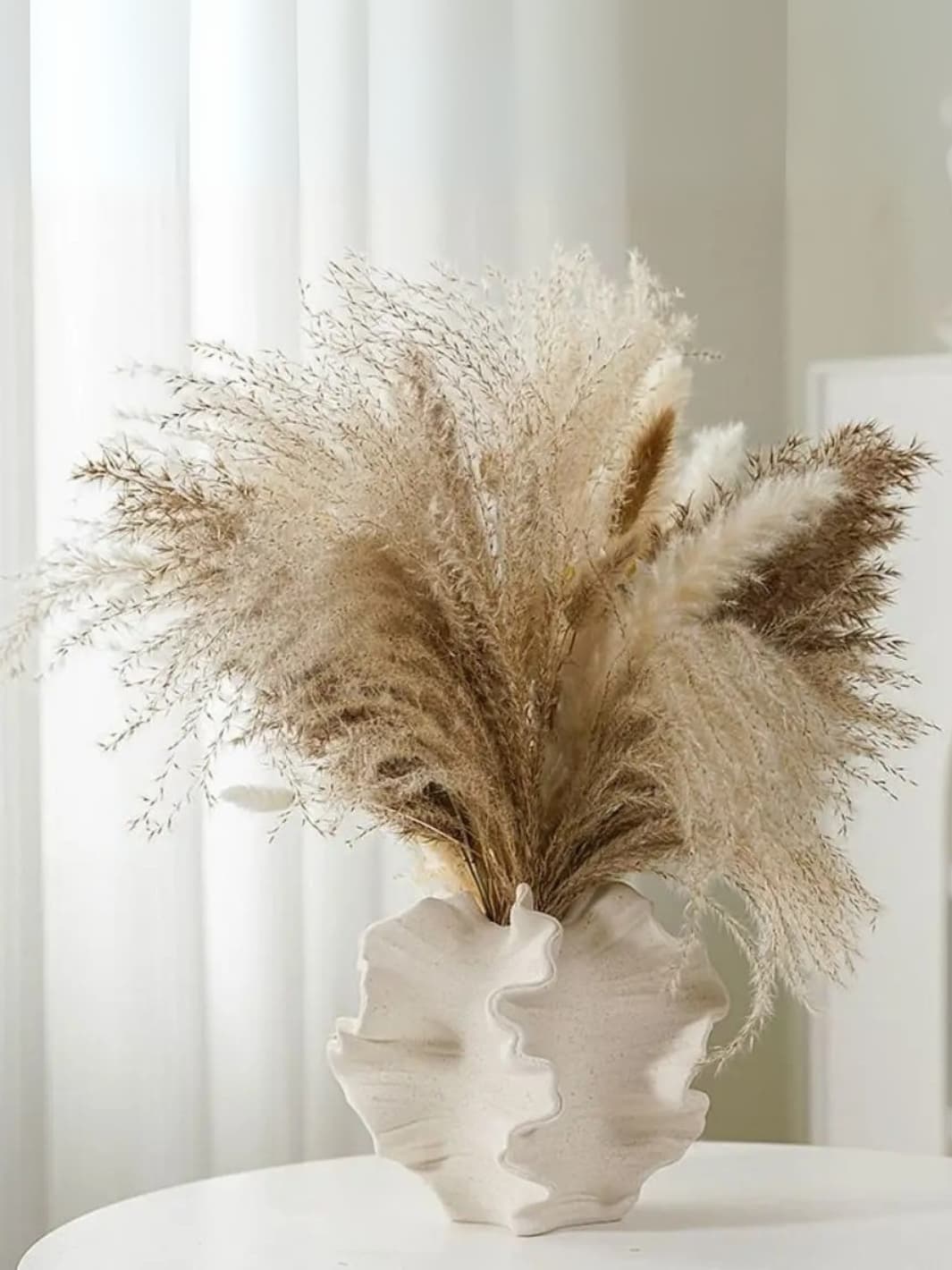 Vase | Coquillage noir design en céramique ondulée