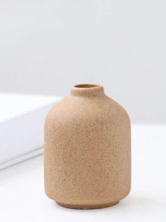 Vase | Contenant arrondi en céramique brute